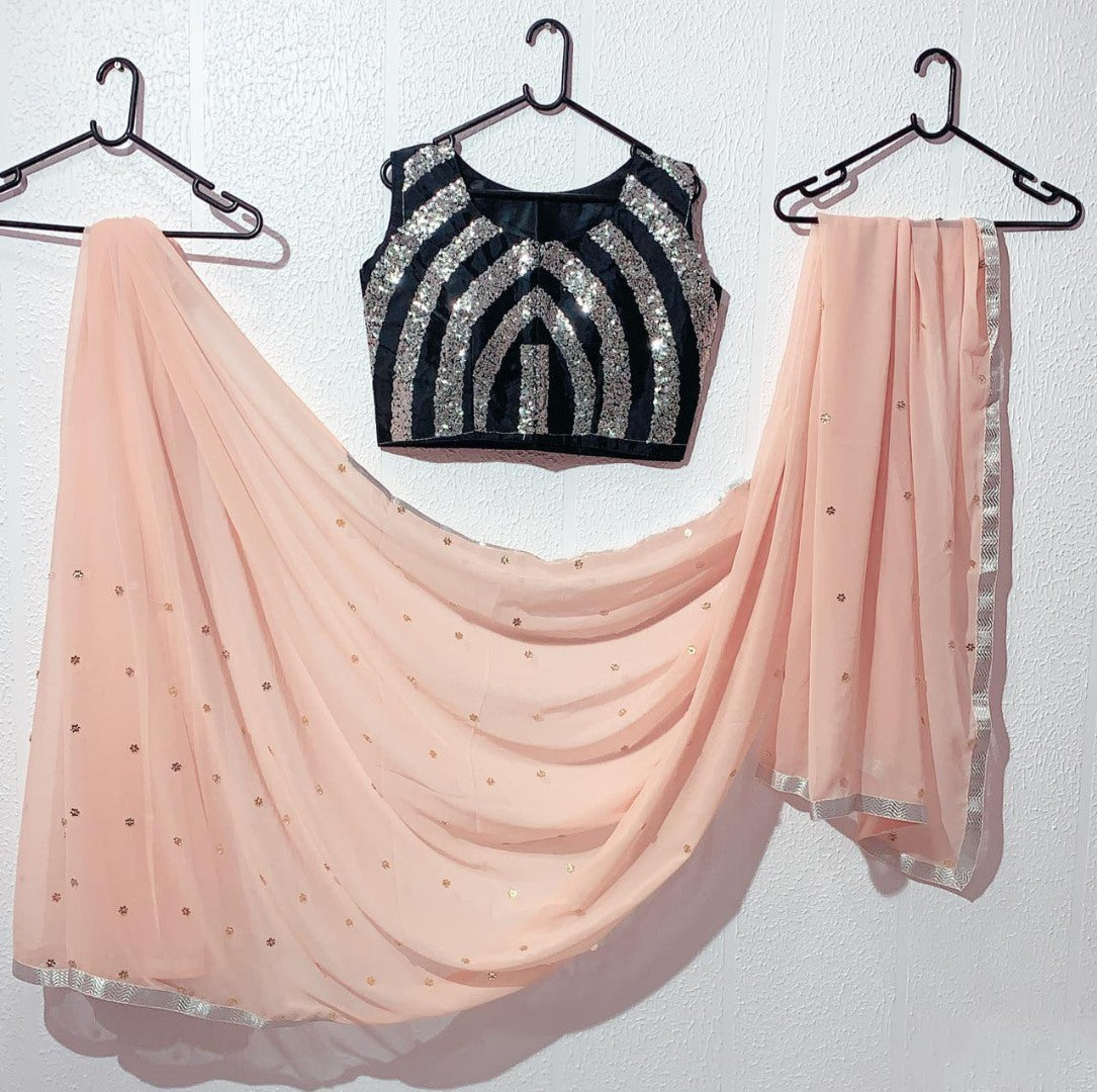 Peach Georgette beautiful stone work saree with sequin work blouse