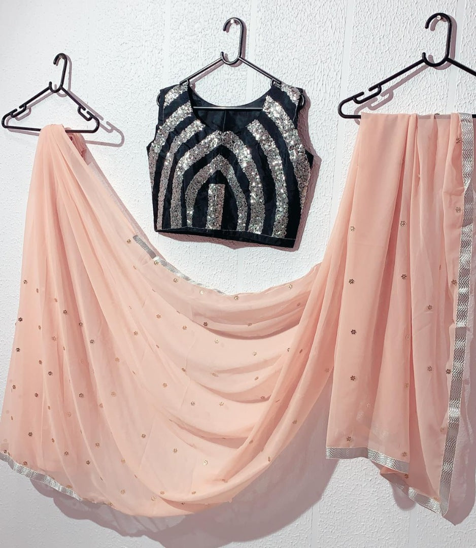 Peach Georgette beautiful stone work saree with sequin work blouse
