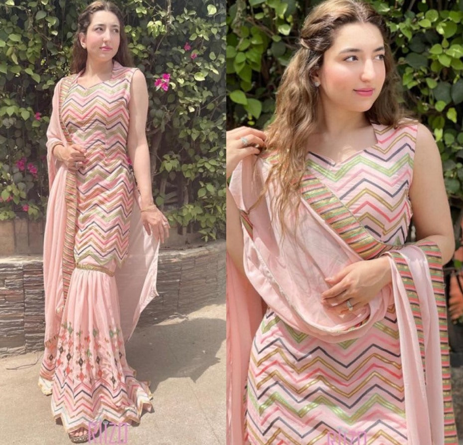 Peach georgette embroidered chen ruffle work shrara plazzo suit