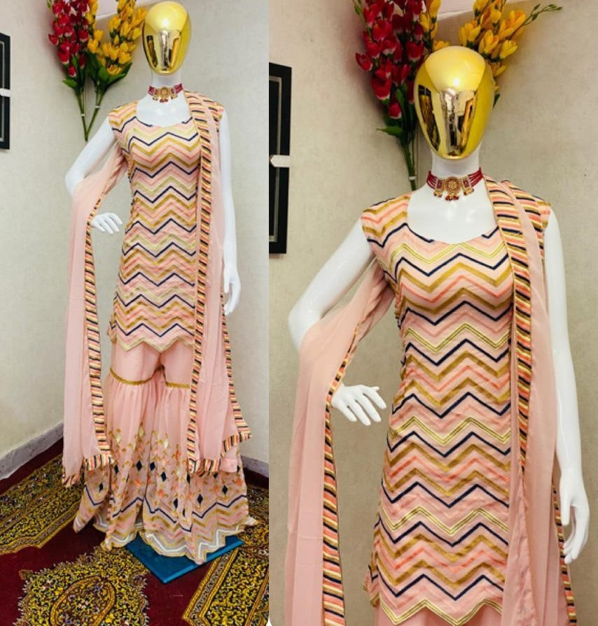 Peach georgette embroidered chen ruffle work shrara plazzo suit