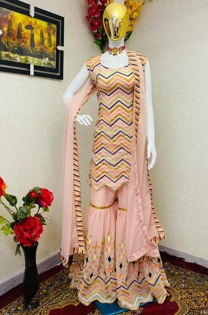 Peach georgette embroidered chen ruffle work shrara plazzo suit