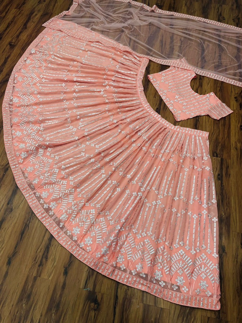 Peach georgette heavy embroidered wedding lehenga choli