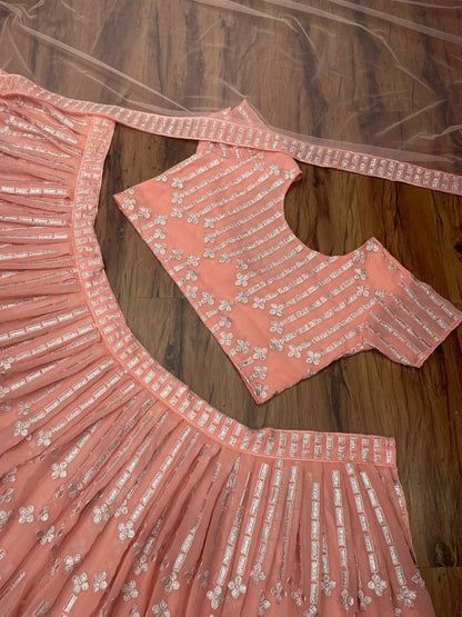 Peach georgette heavy embroidered wedding lehenga choli