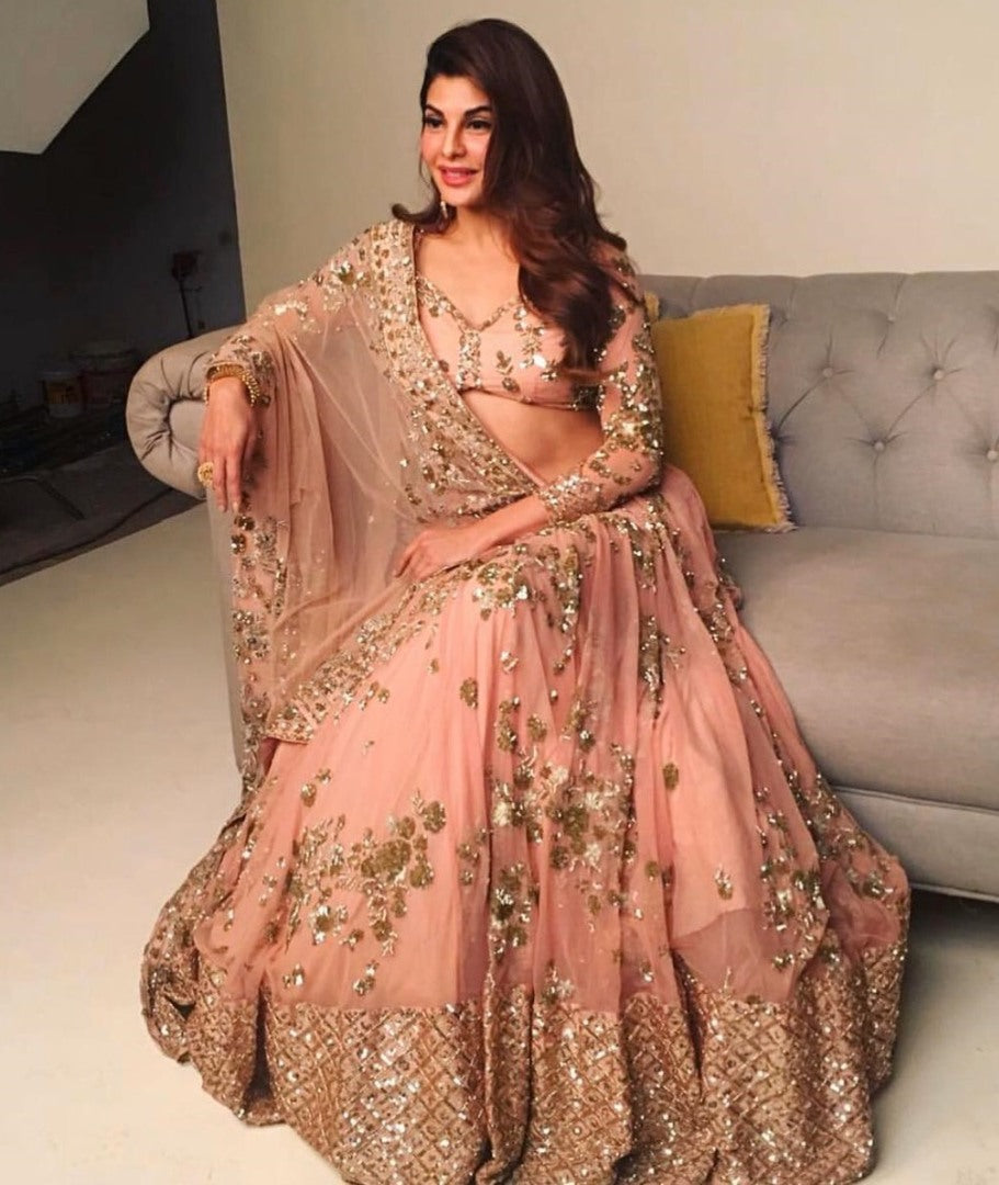 Peach georgette heavy sequence and thread work wedding lehenga choli