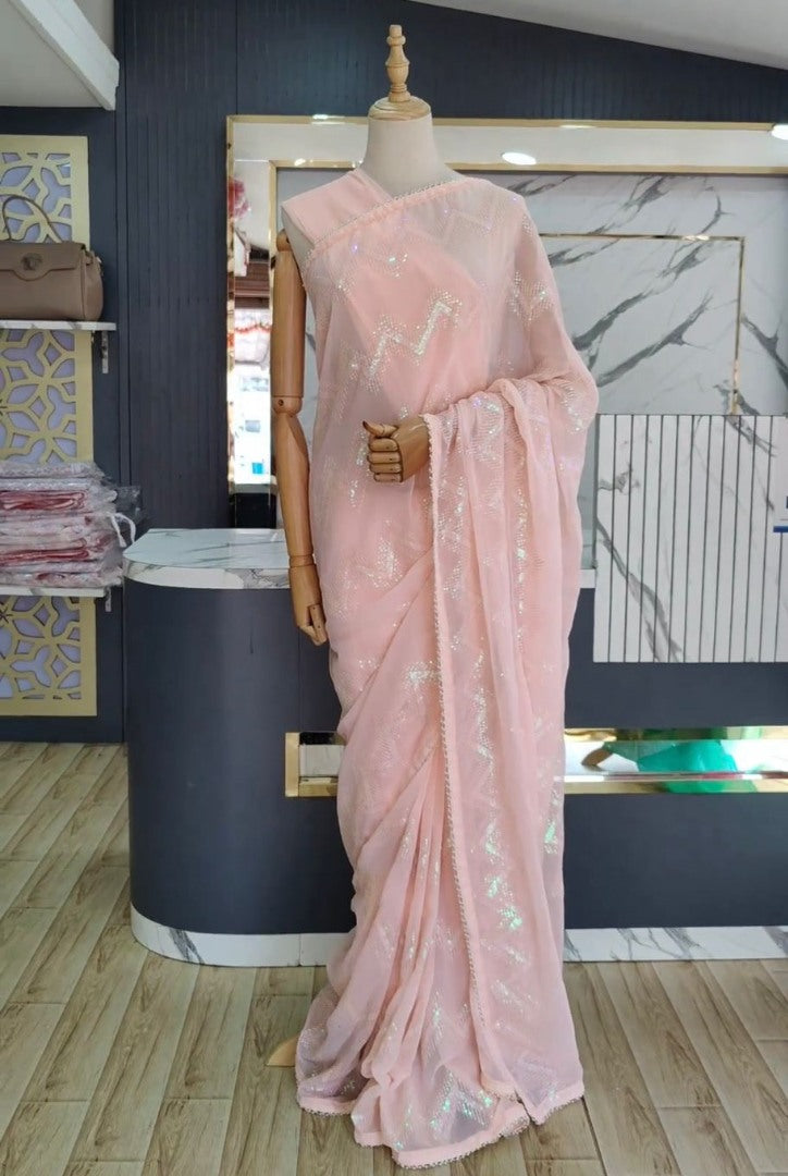 Peach georgette heavy thread sequence work saree