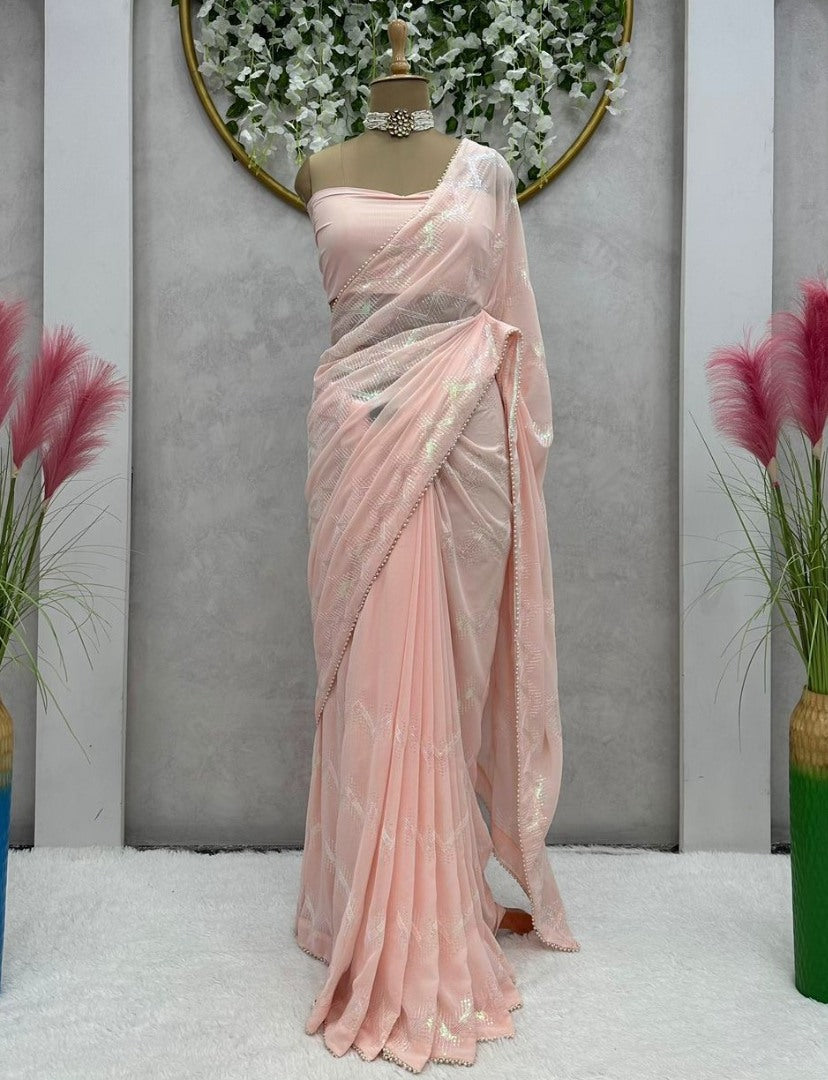 Peach georgette heavy thread sequence work saree