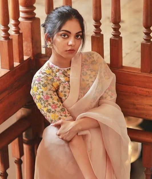 Peach georgette plain festive saree with embroidered blouse