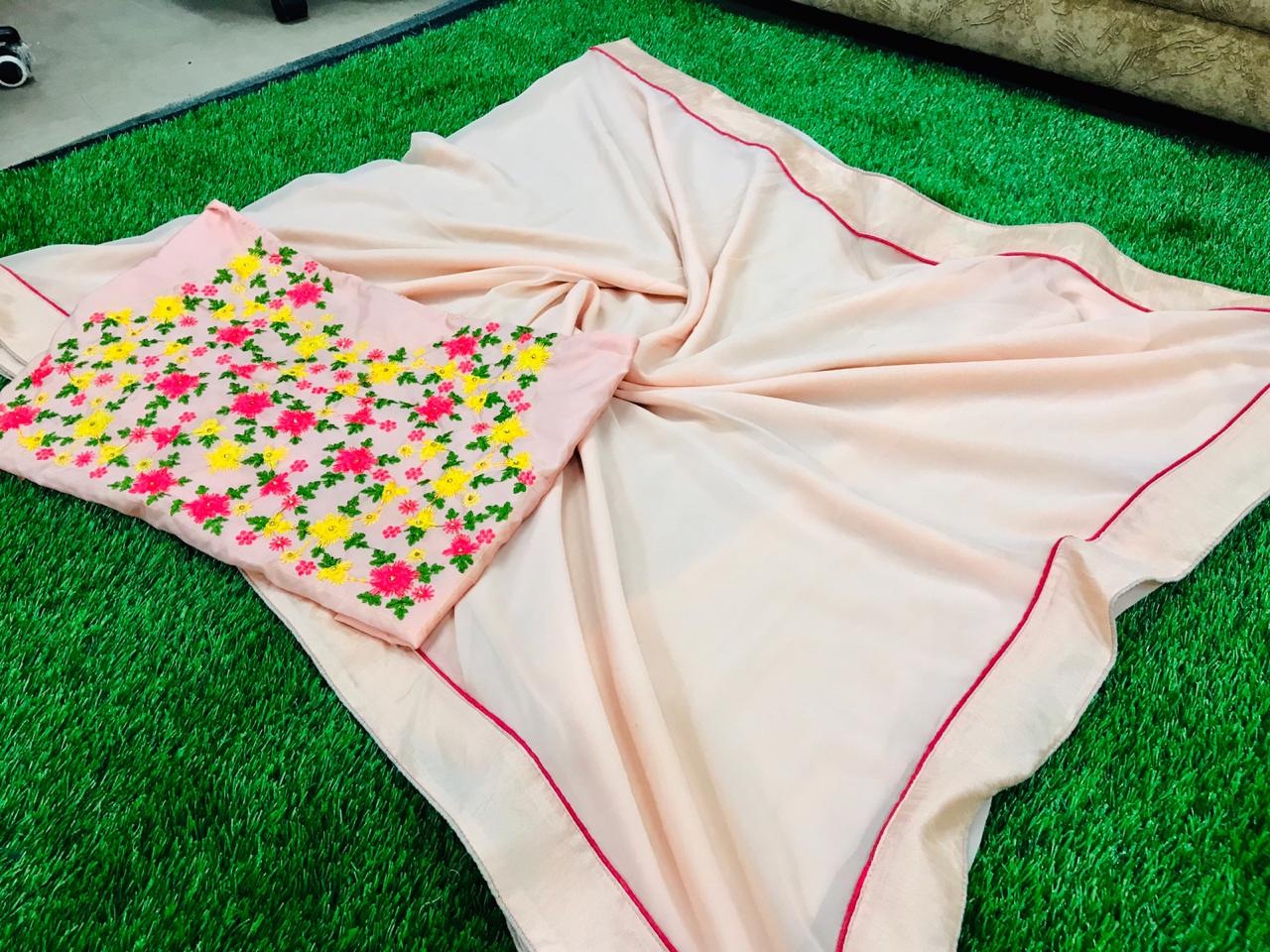 Peach georgette plain festive saree with embroidered blouse