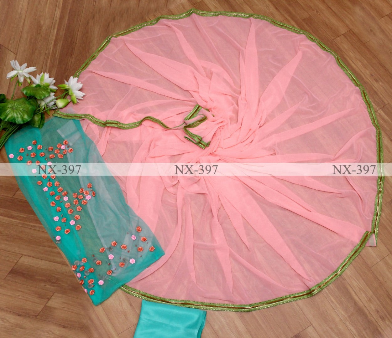 Peach georgette saree with flower work blouse