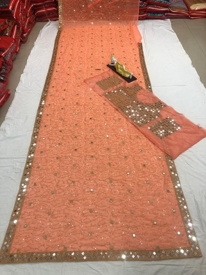 Peach georgette sequence work and acrylic mirror work designer saree
