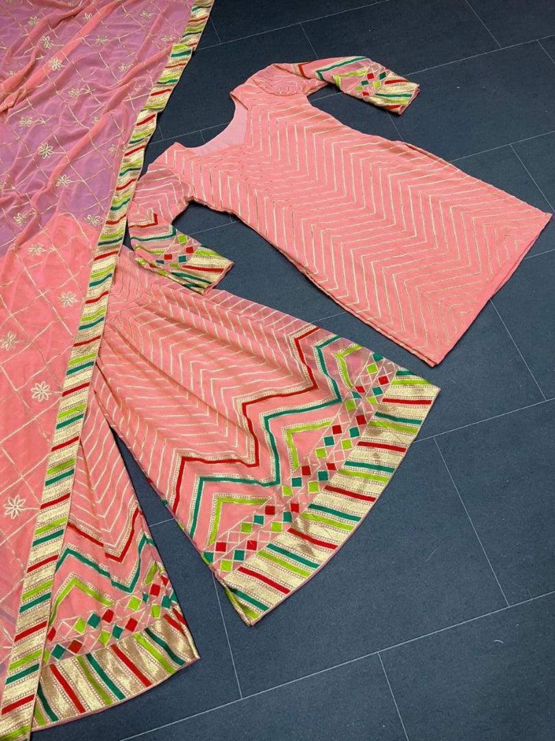 Peach georgette thread work sharara suit