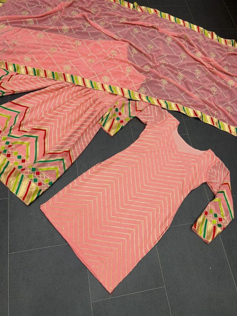 Peach georgette thread work sharara suit