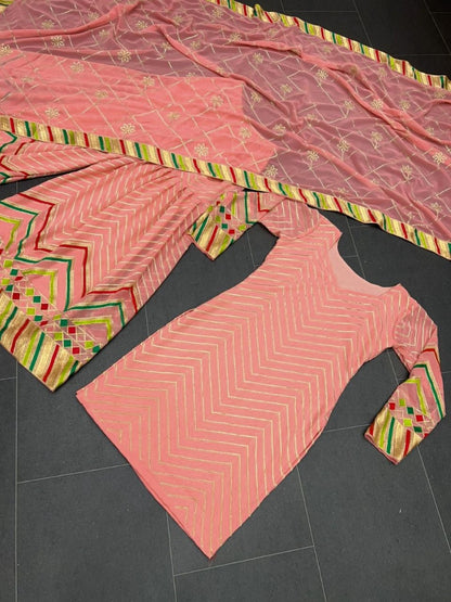 Peach georgette thread work sharara suit