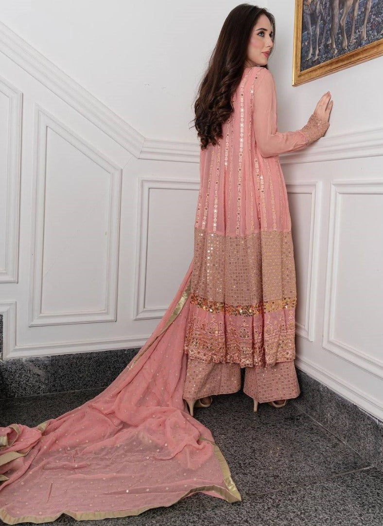 Peach heavy embroidery worked salwar suit with shrug