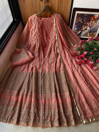 Peach heavy embroidery worked salwar suit with shrug
