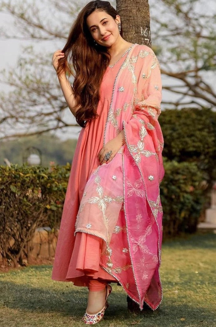 Peach heavy georgette flared gown with embroidered dupatta