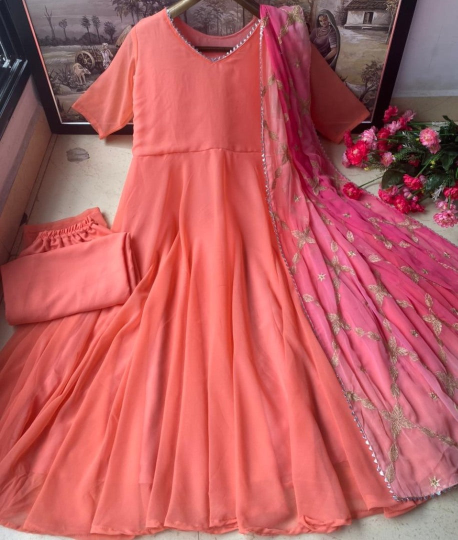 Peach heavy georgette flared gown with embroidered dupatta
