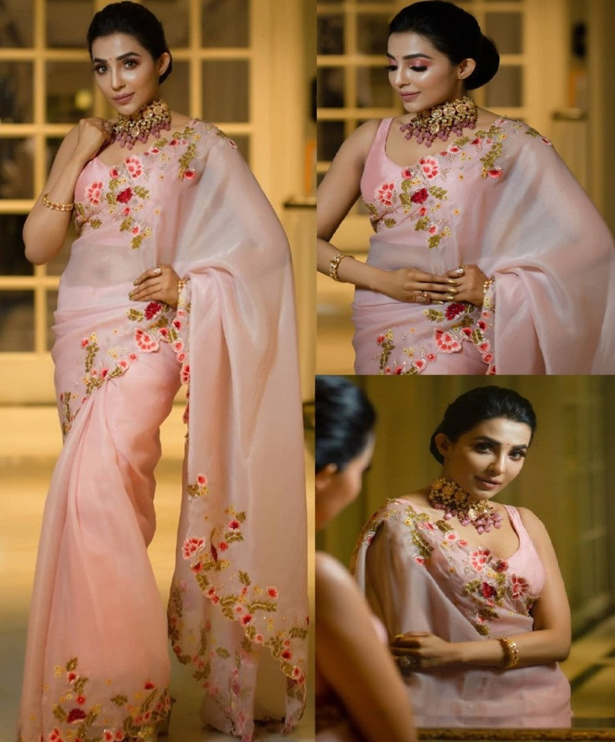 Peach heavy kasturi silk georgette thread work saree