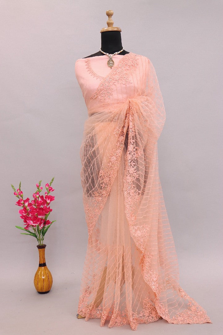 Peach mono net embroidery worked designer saree