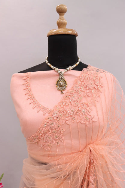 Peach mono net embroidery worked designer saree