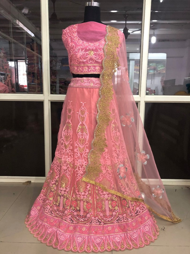 peach mono net heavy embroidered bollywood style wedding lehenga