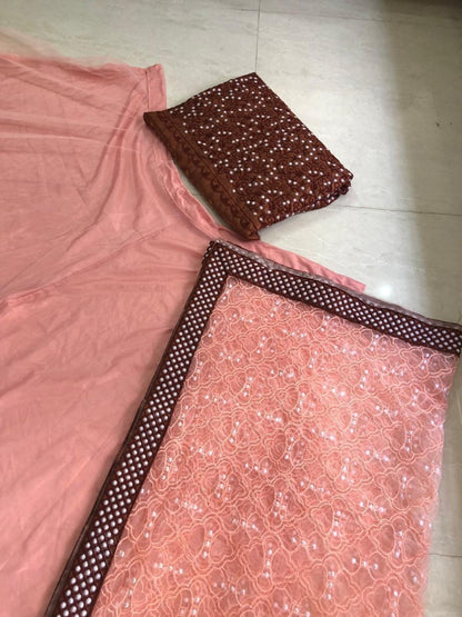 Peach net ceremonial lehenga choli