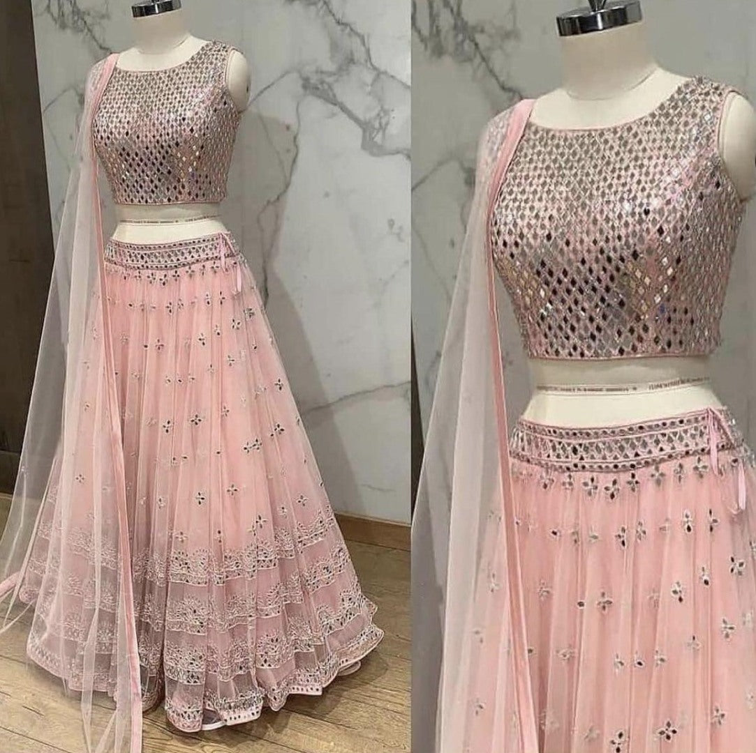 Peach net embroidered ceremonial lehenga choli