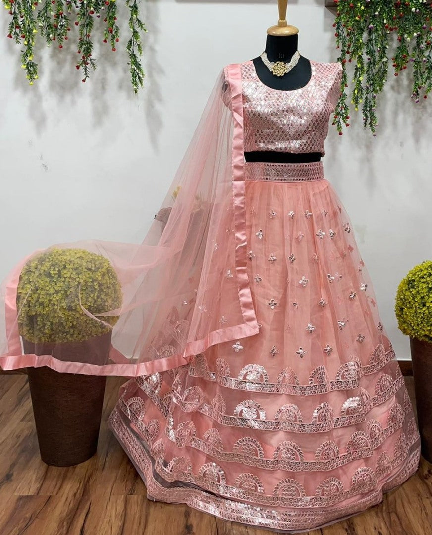 Peach net embroidered ceremonial lehenga choli