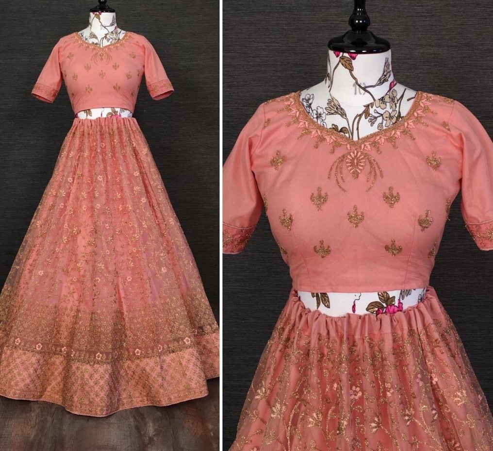 Peach net glitter zari embroidered border work lehenga choli