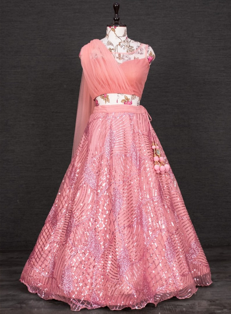 Peach net heavy sequence embroidered brides maid crop top lehenga