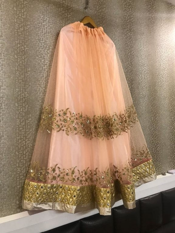 peach net sequence embroidered partywear lehenga