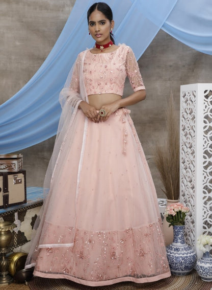 Peach net sequence thread embroidered party wear lehenga choli