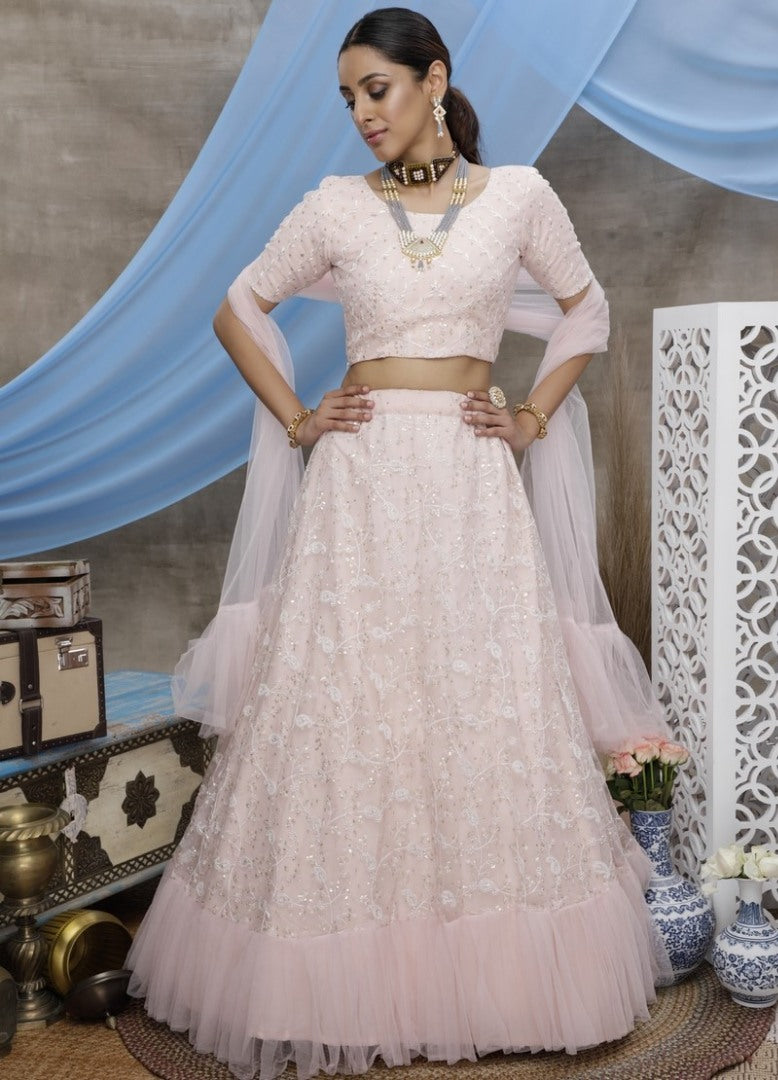 Peach net sequence thread embroidered party wear lehenga choli