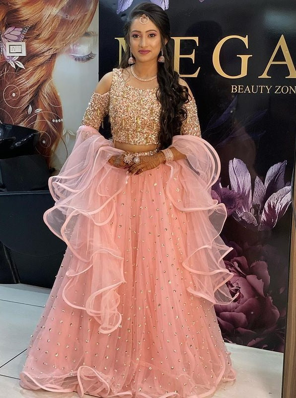 Peach net sequence work party wear lehenga choli