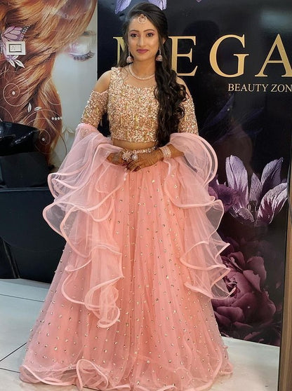 Peach net sequence work party wear lehenga choli