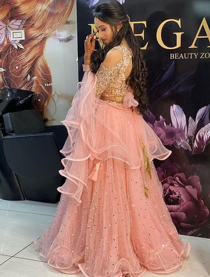 Peach net sequence work party wear lehenga choli