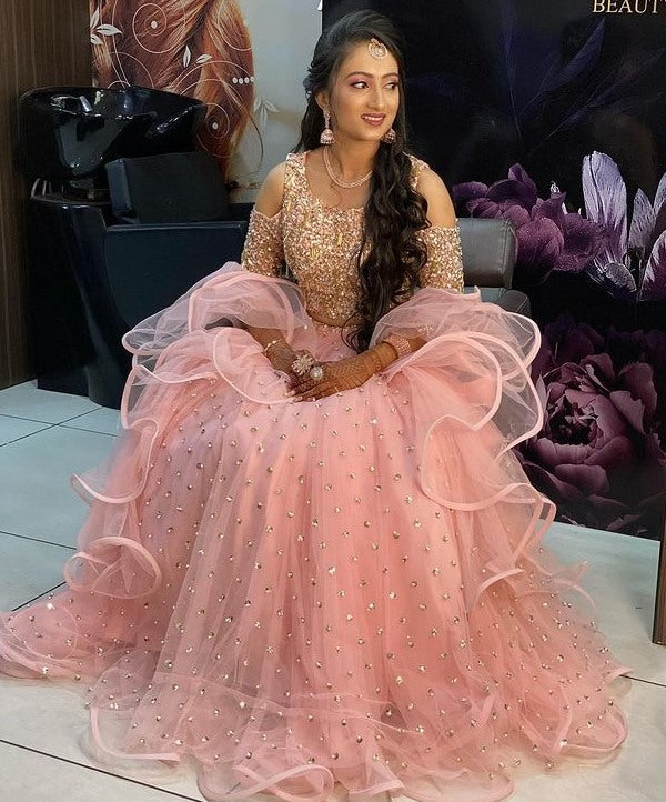 Peach net sequence work party wear lehenga choli