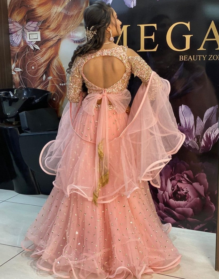 Peach net sequence work party wear lehenga choli
