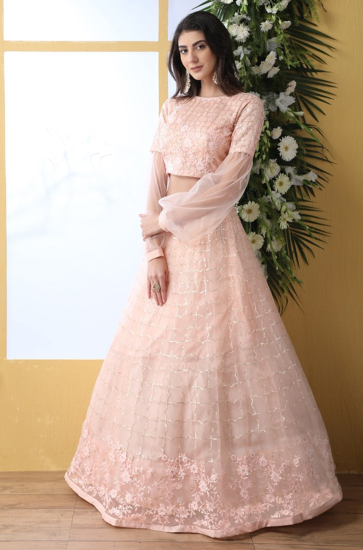 Peach net thread embroidered wedding lehenga choli