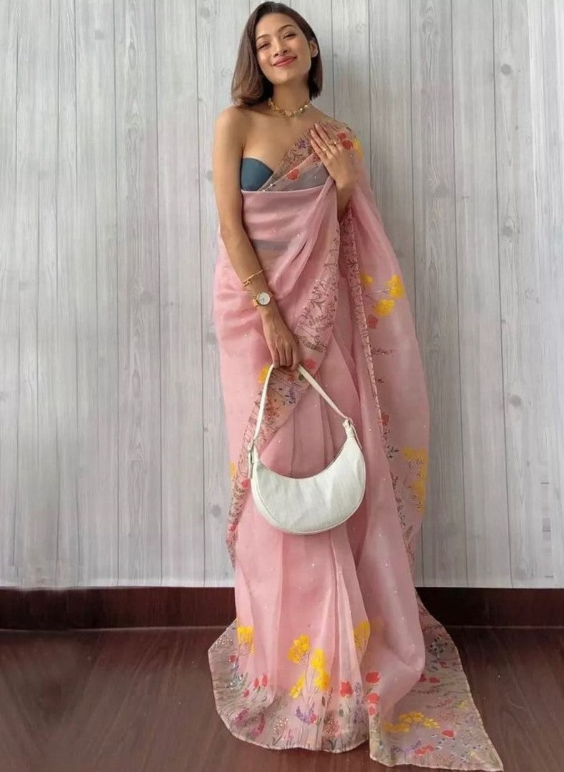 Peach organza print and hand worked saree