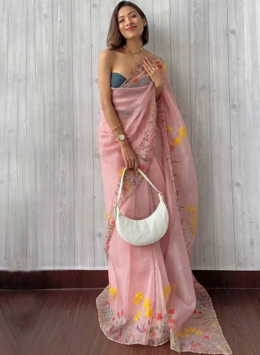 Peach organza print and hand worked saree