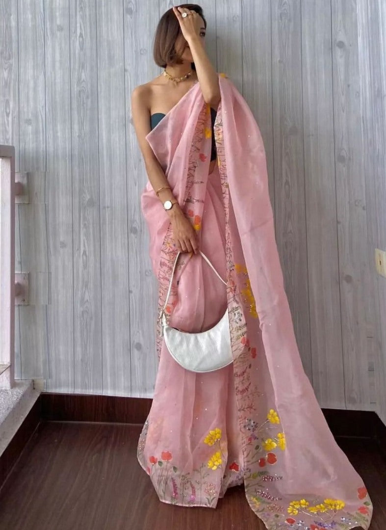 Peach organza print and hand worked saree