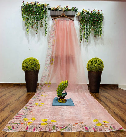 Peach organza print and hand worked saree