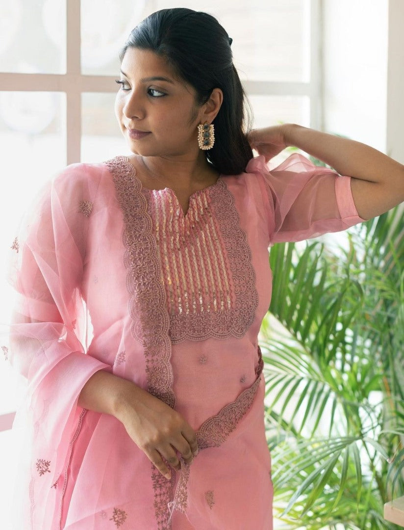 Peach organza thread and sequence embroidered salwar suit