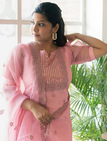 Peach organza thread and sequence embroidered salwar suit