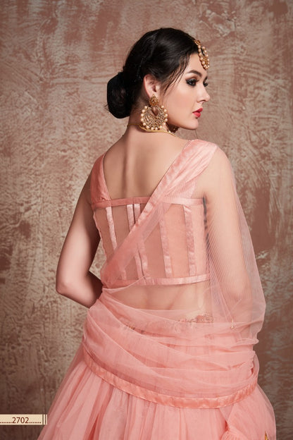 Peach soft net beautiful ruffle layer lehenga for ceremony
