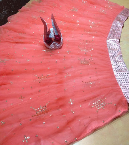 Peach soft net embroidered lehenga choli for ceremony