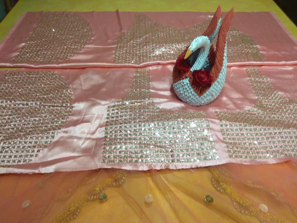 Peach soft net embroidered lehenga choli for ceremony