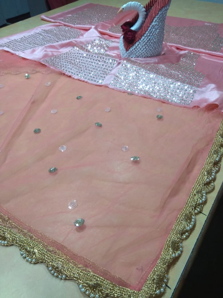 Peach soft net embroidered lehenga choli for ceremony