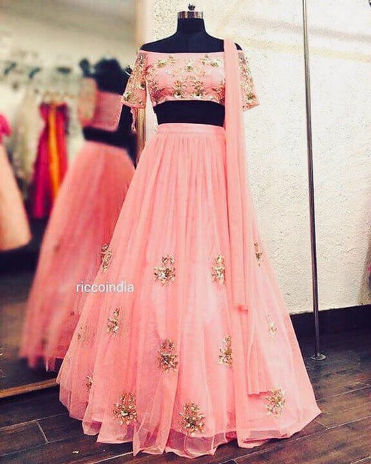Peach soft net embroidered wedding lehenga